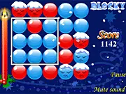 Winter Blocky Puzzle free online game screenshot showing a grid of red and blue blocks with a large square section of matching color highlighted for removal