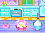 Screenshot of the Doll House Cake Cooking game showing a fully decorated, multi-tiered cake shaped like a miniature house.