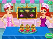 Screenshot of Color Girls Homemade Cupcakes game showing brightly colored cupcakes with various sweet toppings and sprinkles.