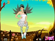 Screenshot of the Autumn Fairy Dress Up game showing a beautiful fairy character with flowing hair, wearing an elegant gown in red and gold autumn colors, with large magical wings.