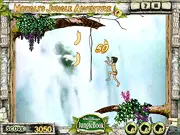 Screenshot of Mowgli's Jungle Adventure game showing a cheerful Mowgli climbing a tree vine while collecting a yellow banana in a lush 2D jungle platforming environment.