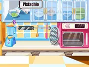 Screenshot of the Make Pistachio Torte cooking game showing a layered torte being decorated with white frosting and chopped green pistachios.