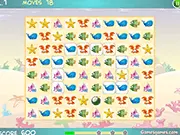 Underwater Secrets Match 3 free online game screenshot showing colorful sea creatures and objects on a puzzle grid