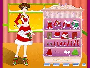 Christmas Girl Dressup game screenshot, a girl wearing a festive red dress and a Santa hat
