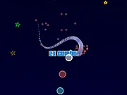 Orbis Impetus free online arcade game screenshot showing colorful circles and stars in abstract space