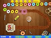 Marble Doughnut Popper free online game, shoot colored doughnuts to match three, police inspector arcade puzzle game