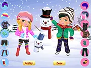 Two girls dressed in fashionable winter outfits with snow in the background, promoting the Snow Fashion Dress Up online game