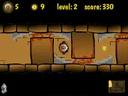 Screenshot of Catacombs 2 Labyrinth of Death, showing the adventurer avoiding spikes inside an Egyptian pyramid.