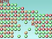 A screenshot of the Makarov Bubbles 3 game with a cannon aiming a colorful bubble at a large cluster of matching colored bubbles overhead.