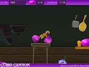 Curio Cannon free online game screenshot showing a cannon about to launch a doll towards a cluster of colorful crystal gems.