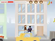 Little Rolf in the Big City game screenshot showing a cartoon character, Rolf, fighting a ninja on the roof of a brightly colored, fast-moving car in a cityscape.