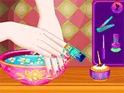 The final manicure and hand spa result, showing a mom's hand with bright nail polish, sparkling rings, and delicate nail art from the Baby Hand Spa For Mom online game.
