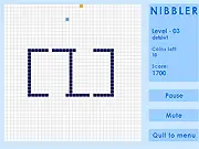 Play Nibbler Snake Online free action game, showing the snake creature navigating obstacles and collecting food on a challenging level