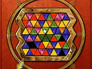 Screenshot of the Truzzle or Trizzle game board, showing a hexagonal grid filled with colorful tiles, highlighting a potential three-piece match.
