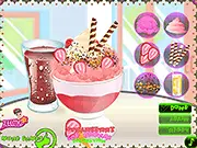 Play Strawberry Ice Cream Decoration free online game screenshot. A beautifully decorated pink strawberry ice cream sundae in a glass, covered with cherries, sprinkles, and whipped cream.