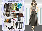 The Tribal Trend dress up game screenshot showing a model wearing a patterned top and large ethnic jewelry - PlayArcadeHub