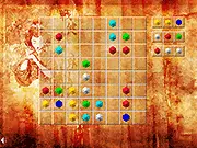 Screenshot of Gemstone Chaos free online puzzle game showing a grid board filled with multi-colored gemstone blocks and space available for the next placement.