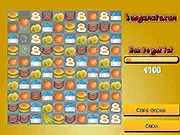 Screenshot of How to Get Fat: Match 3 game board showing various colorful food items, like cakes and sweets, arranged in a grid