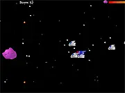 Screenshot of Asteroid Rampage showing a large, central asteroid destroying a fleet of small enemy ships in space