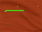 Screenshot of Radioactive Snakes from Mars showing two colored snakes moving freely at angles on a dark, alien-themed grid, with glowing pills visible
