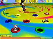 Vhack-a-Vole free online game screenshot, cartoon voles popping out of five brown holes on a green field background on PlayArcadeHub