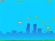 Play Nutty McNuts online free physics game, showing the squirrel being launched past deadly buzz saws and flame throwers toward a target