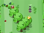 Tumblebrook Slalom online racing game screenshot of a character sliding down a green grassy hill through slalom gates.