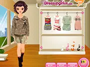 Screenshot of a fashionable female teenage model posing on a runway, wearing a stylish, modern outfit and various accessories.