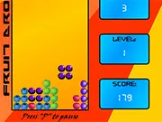 The free online game Fruit Drop showing various colorful fruits like apples and berries falling into an arcade game well