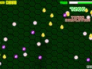 The player using a central magnet to collect falling blue geometric shapes in the Magnet Towers 2 free online arcade game.