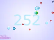 The player's icon moving to collect a blue bubble while narrowly avoiding a red bubble in the Bubblin free online arcade game.