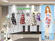 Online dress-up game screen showing a model wearing a long, elegant dress with a large floral print.