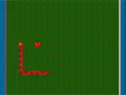 Red Snake Classic free online arcade game screenshot showing a red snake on a grid with food pellets.