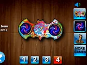 Screenshot of Fidget Spinner Mix 2 free online game showing a customized, colorful fidget spinner spinning rapidly on a dark background