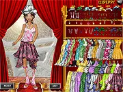 The main screen of Grace's Floral Fashion free dress-up game, showing the girl Grace happily wearing a colorful, stylish dress with a beautiful floral pattern.