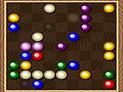Marble Lines Mobile free online puzzle game board showing a grid with colorful marbles and a line of five matched marbles ready to disappear
