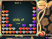 Marblets free online puzzle game screenshot showing a grid of colorful, connected marbles ready to be cleared for a high score.