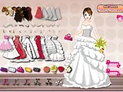 The main screen of the Marry Me Dressup game showing a bride model in a white wedding dress and a menu sidebar with options for changing the hairstyle, veil, gown, and jewelry.