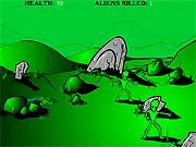 Play Alien Scum Slaughter free action game - a top-down view of a character shooting at green alien enemies outside a house