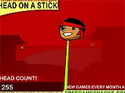Play Head on a Stick free online balancing game. Image showing a round head balanced precariously on a thin wooden stick.
