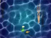 The little sea turtle character narrowly dodging a large fish in the Dodge Fishy online game, available on PlayArcadeHub