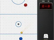 Air Hockey Tournament free online game featuring two paddles and a puck on an air hockey table ready for a competitive match.