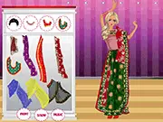 Screenshot of Traditional Saree Dress Up game showing a model wearing a beautifully draped Saree dress with traditional Indian jewelry. Play the free online Indian fashion game.