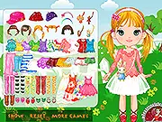Play Lawn Day Doll Dress Up game, featuring an adorable doll ready to be dressed in a cute outdoor scene with a green lawn.