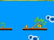 Jump and Take free online bird flying game screenshot with bird aiming for mangoes
