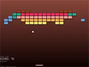 Screenshot of Xenocrate 2 gameplay showing a paddle hitting a ball toward bricks, two players controlling paddles in the 2-player mode, main menu showing the level editor option