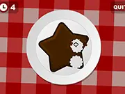 Screenshot of Crumbs! free fast clicking game, showing a large virtual cookie on a wooden table with fragmented pieces.
