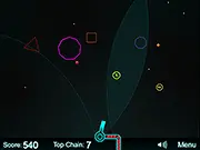 Gameplay screenshot of Sassy Shapes! showing a player ship firing a laser at a descending formation of various colorful polygon and geometric shape enemies.