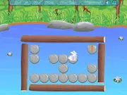 Cute cartoon rabbit looking at a large carrot across a puzzle grid in the free online game I Love Carrot