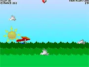 A hang-glider soaring through green mountains while avoiding small birds in the side-scrolling free online game SparrowWatch